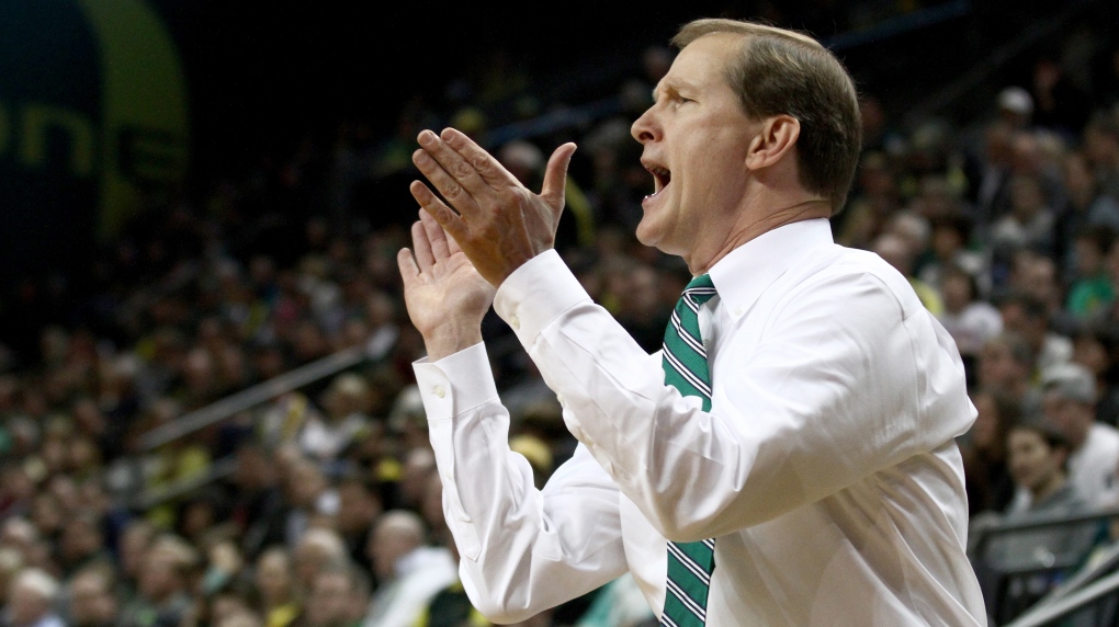Oregon head coach Dana Altman calling plays from the sideline.